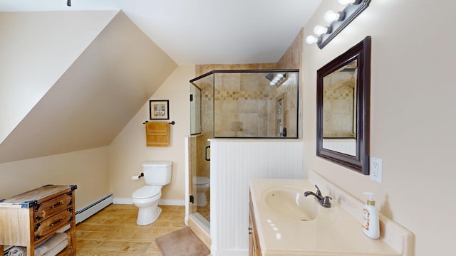 bathroom with wood-type flooring, vanity, an enclosed shower, baseboard heating, and toilet