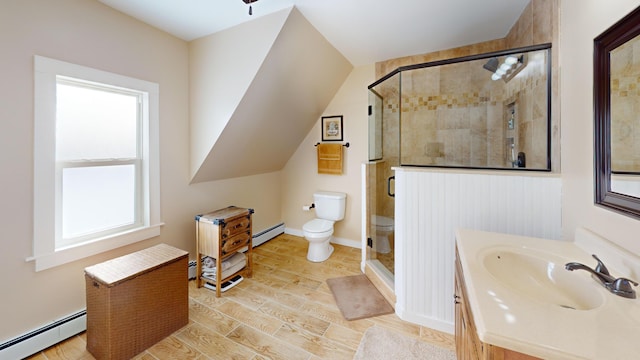 bathroom featuring hardwood / wood-style flooring, walk in shower, baseboard heating, and toilet