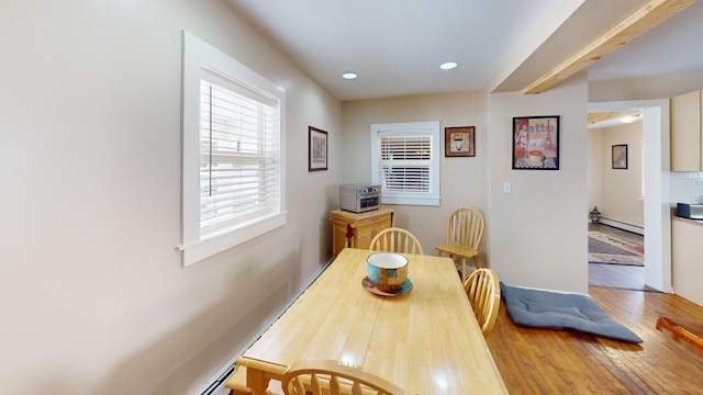 dining area featuring a baseboard radiator