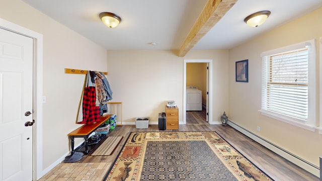 mudroom featuring baseboard heating, wood-type flooring, washer / dryer, and beamed ceiling