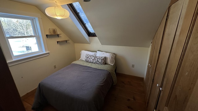 bedroom featuring lofted ceiling