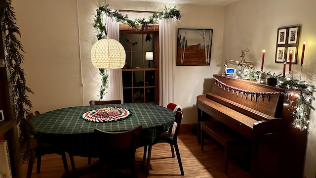 dining area featuring hardwood / wood-style flooring