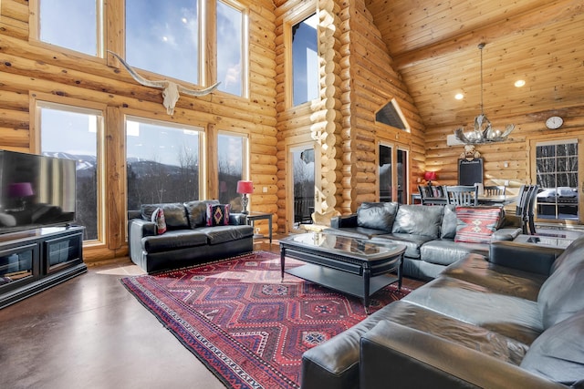 living room featuring wood ceiling, rustic walls, high vaulted ceiling, a notable chandelier, and concrete floors