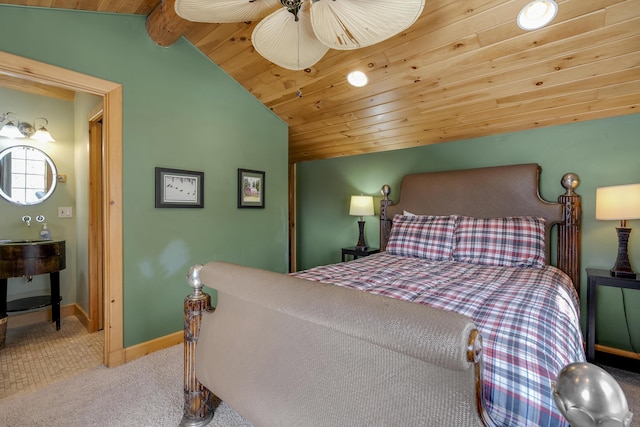 bedroom featuring ceiling fan, carpet floors, lofted ceiling with beams, and wooden ceiling