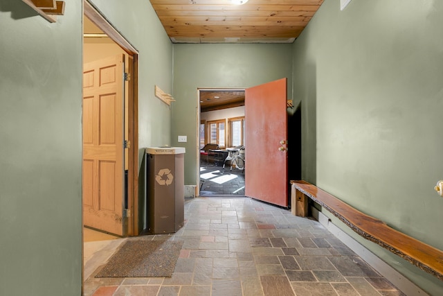 hall featuring wood ceiling