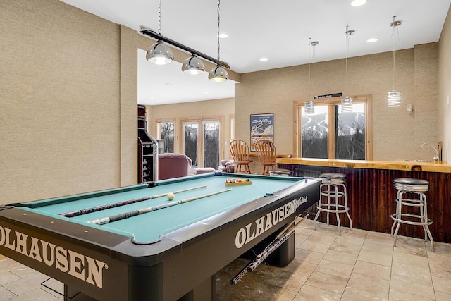 playroom featuring tile patterned flooring, pool table, and indoor wet bar