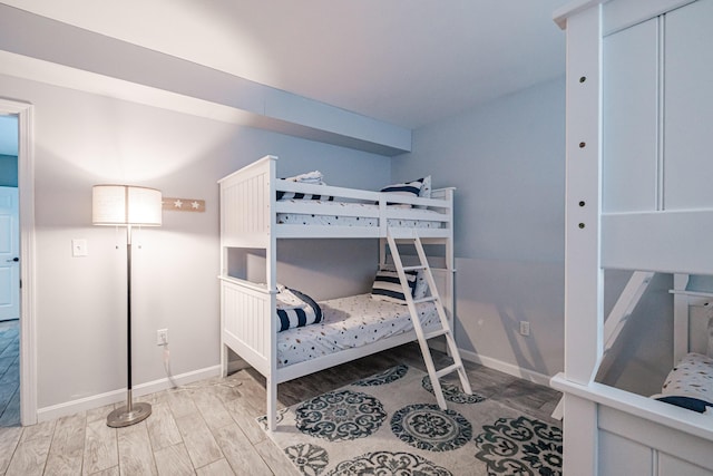 bedroom with light hardwood / wood-style floors