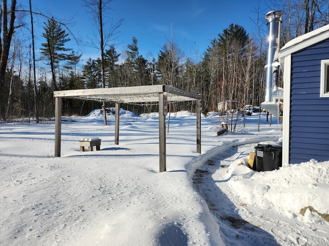 view of yard layered in snow