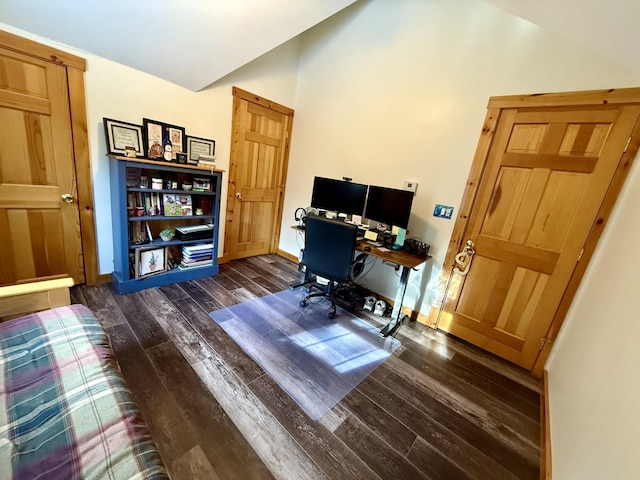 office area with lofted ceiling and dark wood-type flooring