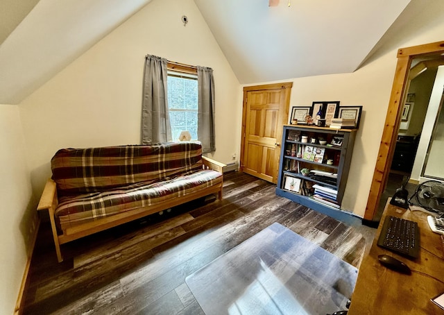 living area with dark hardwood / wood-style flooring and lofted ceiling