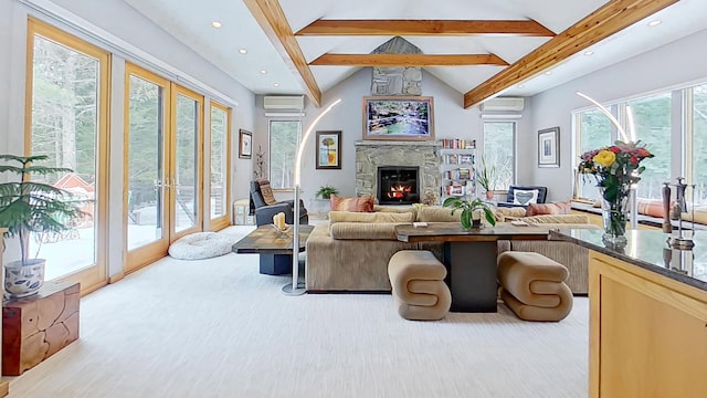 living area with vaulted ceiling with beams, a stone fireplace, recessed lighting, carpet floors, and a wall mounted AC