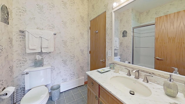 full bathroom featuring an enclosed shower, a baseboard heating unit, vanity, tile patterned flooring, and wallpapered walls