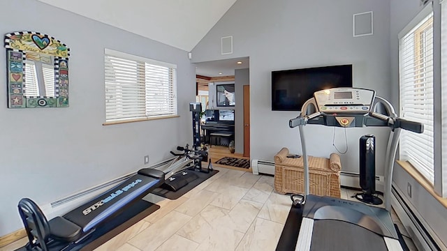 workout area with marble finish floor, a baseboard radiator, visible vents, baseboard heating, and high vaulted ceiling