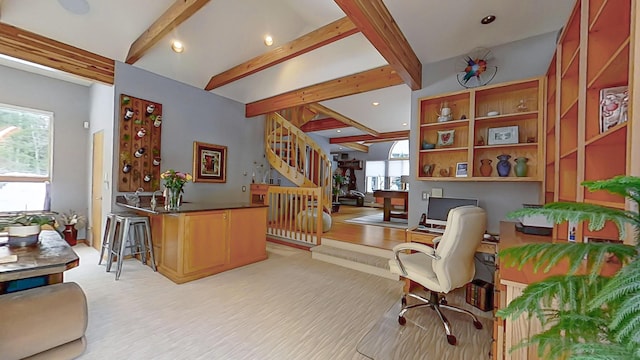 office area with beam ceiling and recessed lighting