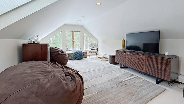 bedroom with vaulted ceiling, a baseboard heating unit, carpet, and recessed lighting