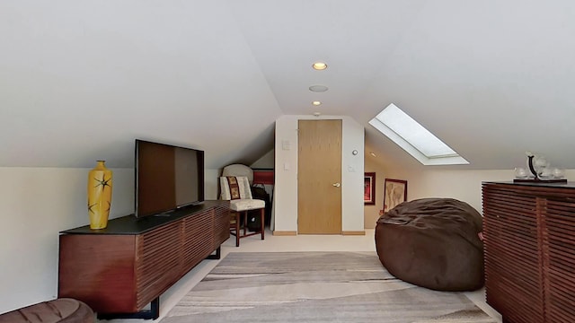 bonus room featuring vaulted ceiling with skylight and recessed lighting