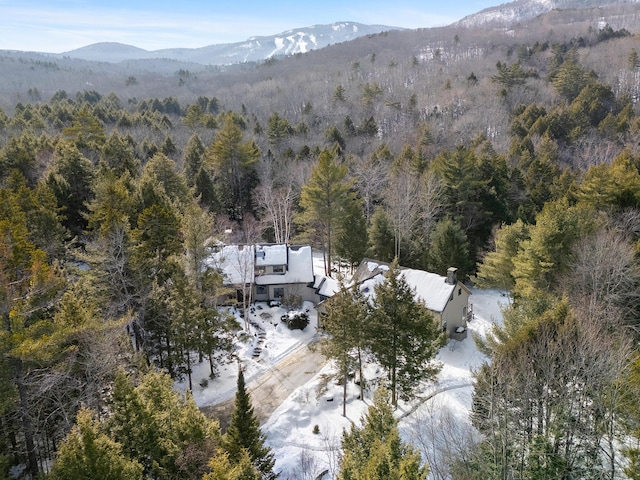 bird's eye view with a mountain view and a view of trees