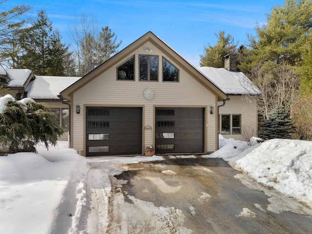 exterior space with aphalt driveway