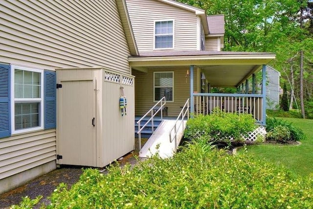 32 Beaver Pond Rd, Kennebunkport, ME 04046 - property entrance with a porch