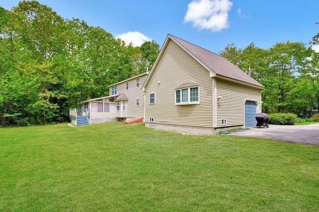 32 Beaver Pond Rd, Kennebunkport, ME 04046 - rear view of house featuring aphalt driveway, a yard, and a deck