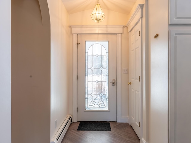 27 Orchard Ln, Minot, ME 04258 - foyer with a baseboard heating unit, vaulted ceiling, wood finished floors, and arched walkways