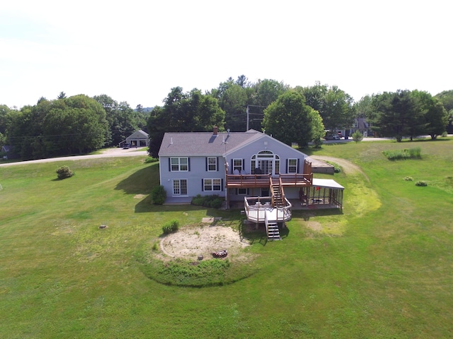 27 Orchard Ln, Minot, ME 04258 - rear view of house with a deck, a lawn, and stairway