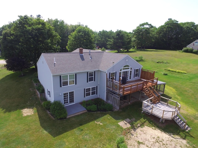 27 Orchard Ln, Minot, ME 04258 - rear view of house with a wooden deck, a yard, and stairs