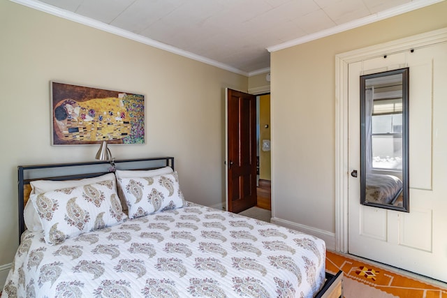 bedroom featuring crown molding