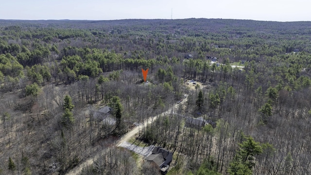aerial view featuring a forest view