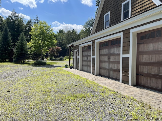 garage featuring driveway