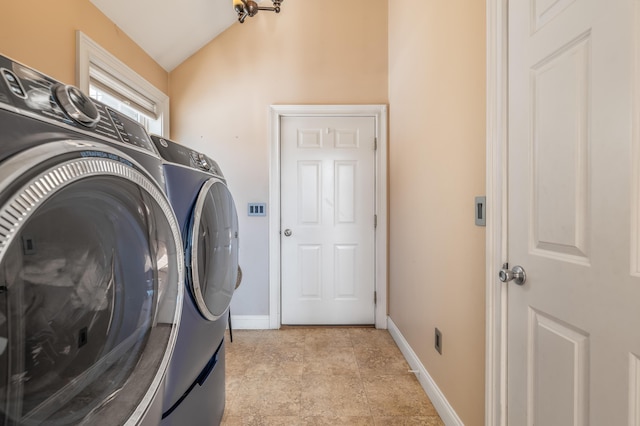 laundry room with separate washer and dryer