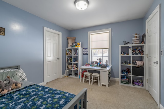 bedroom with light colored carpet