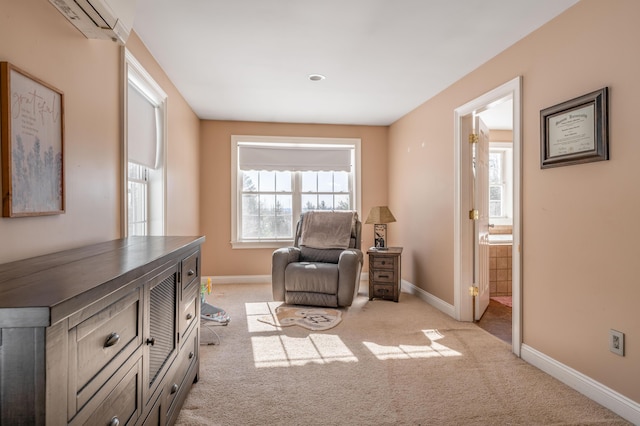 living area with light colored carpet and a wall unit AC