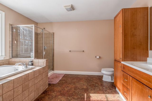 full bathroom featuring separate shower and tub, sink, and toilet