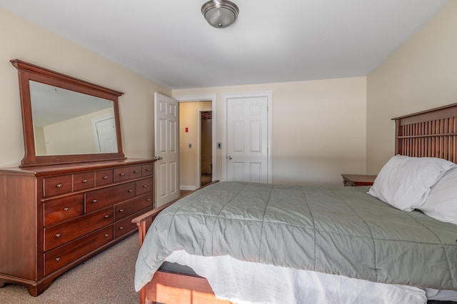 bedroom with light carpet