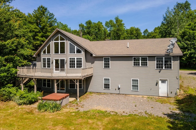 40 Penobscot Ridge Rd, Charleston, ME 04422 - back of house featuring a deck and roof with shingles