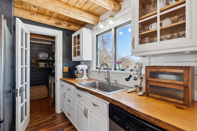 kitchen with wooden ceiling, sink, white cabinets, and butcher block countertops