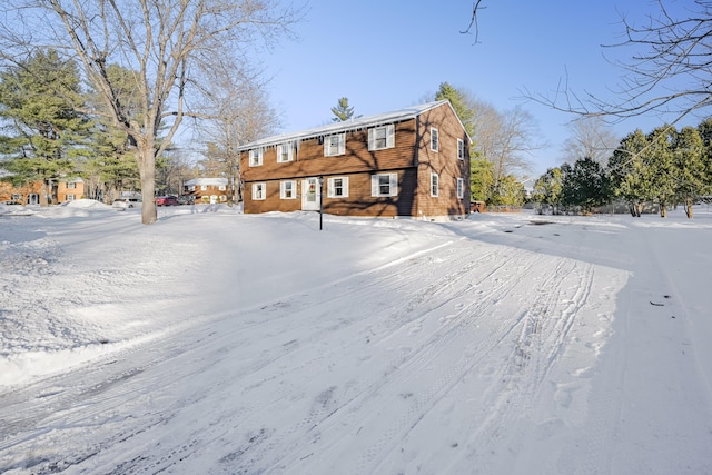 view of snow covered property