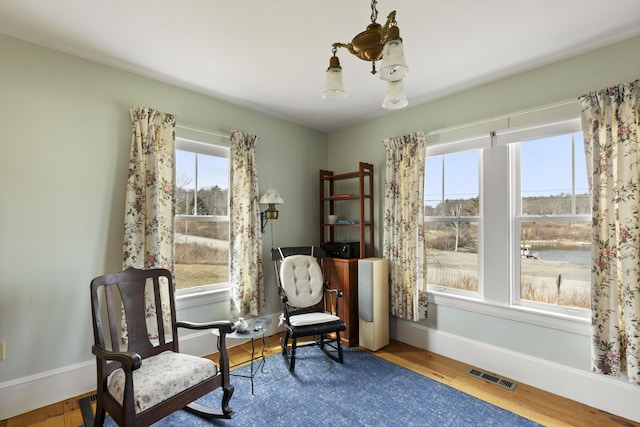 10 Leeman Hill Rd, Bristol, ME 04554 - sitting room featuring baseboards and wood finished floors