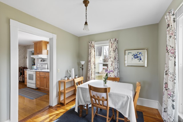 10 Leeman Hill Rd, Bristol, ME 04554 - dining space featuring light wood-type flooring and baseboards