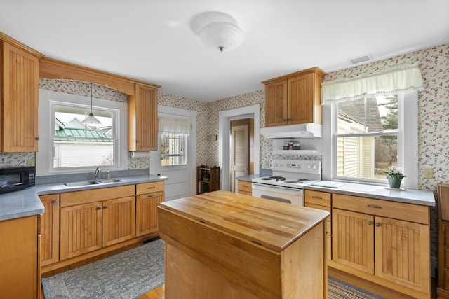 10 Leeman Hill Rd, Bristol, ME 04554 - kitchen featuring white range with electric stovetop, wallpapered walls, wood counters, under cabinet range hood, and black microwave