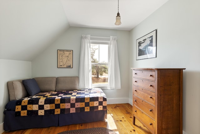 10 Leeman Hill Rd, Bristol, ME 04554 - bedroom with light wood-style flooring, baseboards, and vaulted ceiling