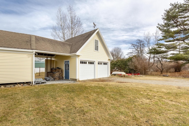 10 Leeman Hill Rd, Bristol, ME 04554 - view of side of home with driveway, a lawn, and a shingled roof