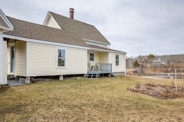 10 Leeman Hill Rd, Bristol, ME 04554 - back of house featuring a shingled roof, a yard, and a deck