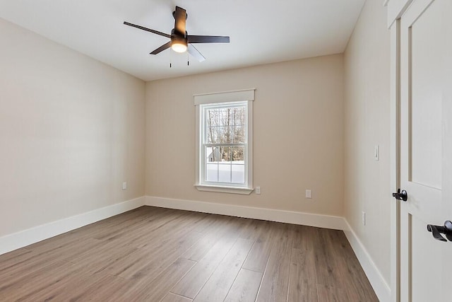 unfurnished room with ceiling fan and light hardwood / wood-style floors