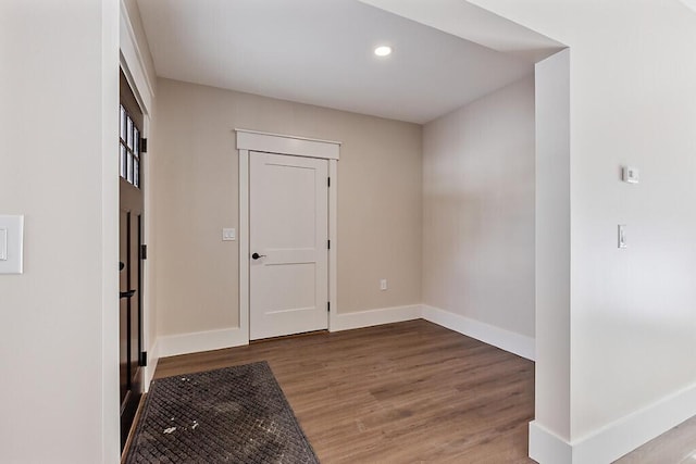 foyer entrance featuring hardwood / wood-style floors