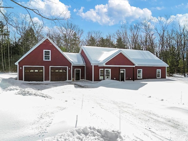 view of snow covered garage