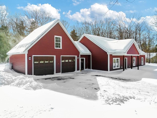 view of snow covered garage