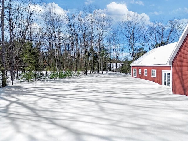 view of snowy yard