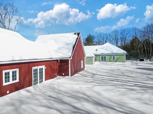 view of snow covered property